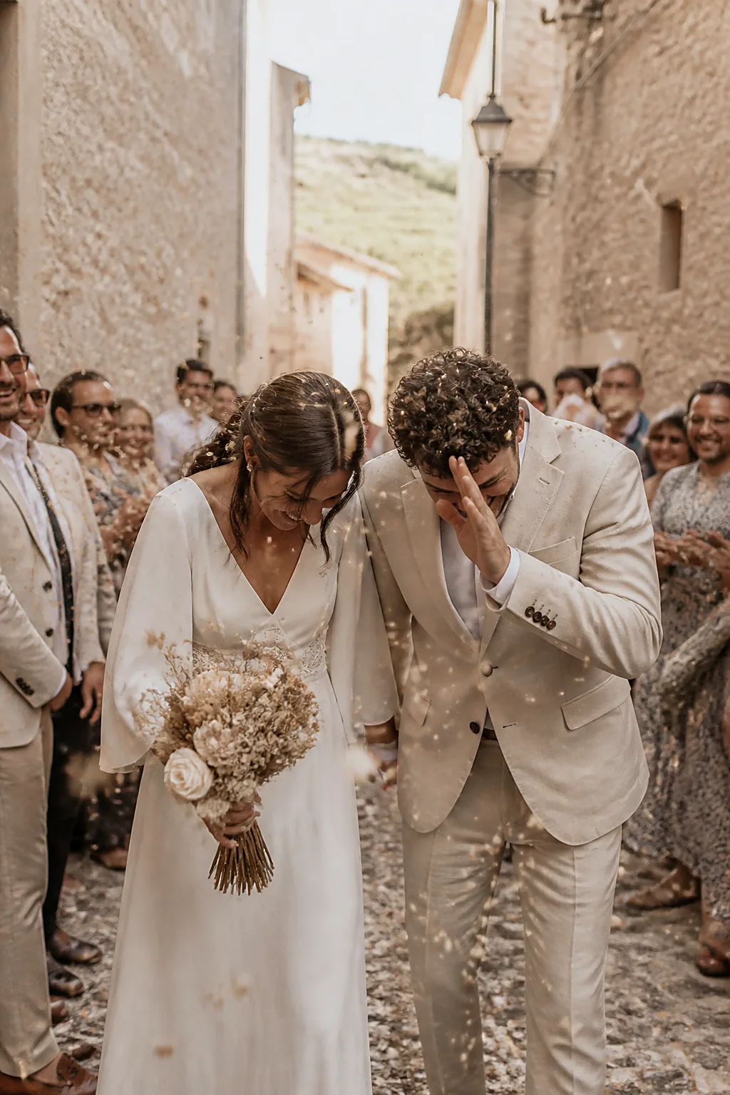 A confetti exit down a village path